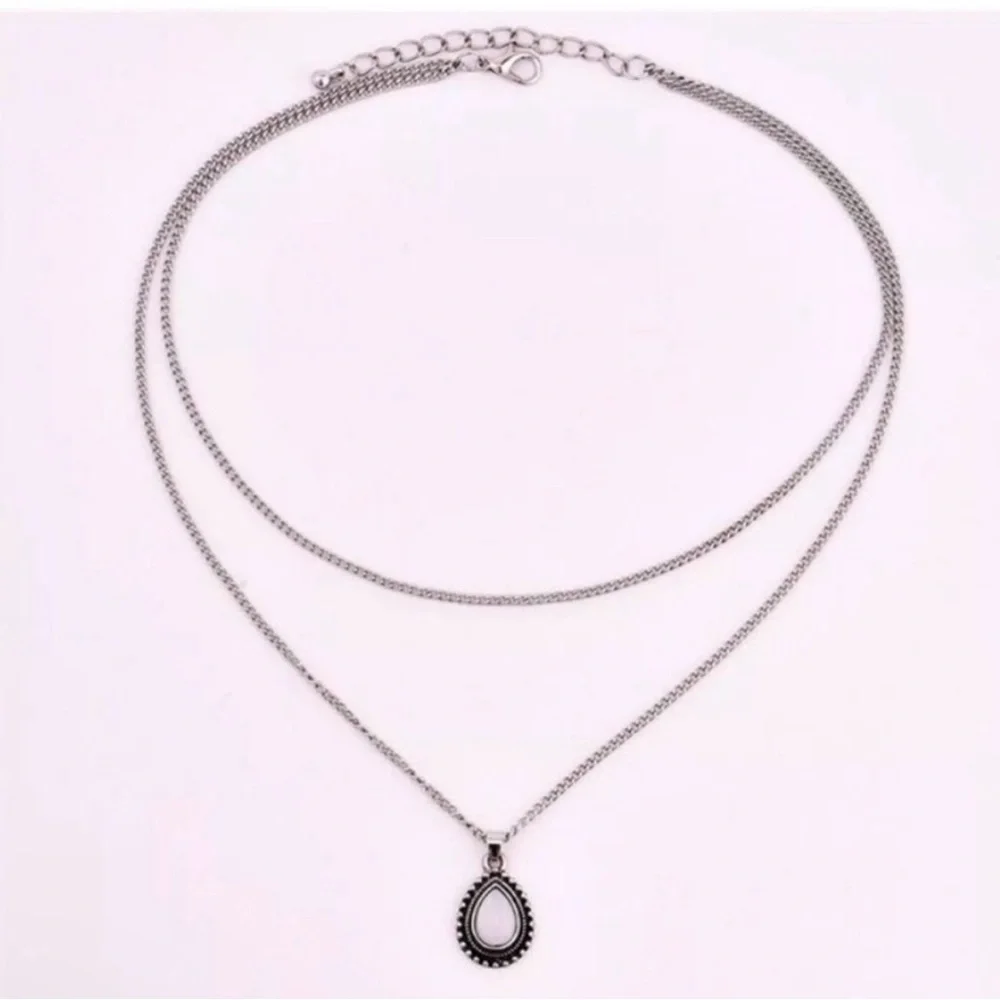 Elegant Silver Pendant Necklace - Picture 2 of 3